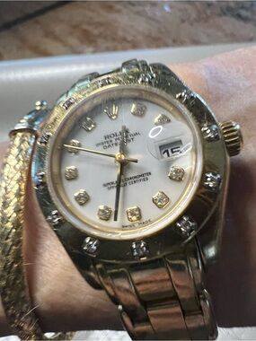 ROLEX Women's Gold pearl master with  Diamond Dial and scattered  diamond bezel